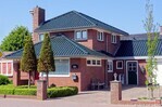 Ingangspartij en zijgevel
<br/>
Gert-Jan Lobbes, mei 2020